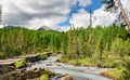 Aktru river and view of North-Chuiskiy Range in the clouds. Altai Republic, Russia