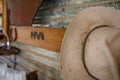 Akubra stockman`s stained and dirty hat on hat stand