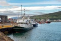 A large tourist boat moored at the whale watching harbor office in Akureyri