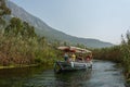 Tour boat on Azmak stream in Akyaka village in Mugla province of Turkey