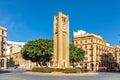 Al-Abed Nejmeh Square clock tower with tree and buildings around, Beirut, Lebanon