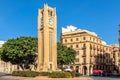 Al-Abed Nejmeh Square clock tower with tree and buildings around, Beirut, Lebanon Royalty Free Stock Photo