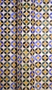 Arab geometric mosaic of Alhambra in Granada, Spain.