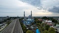 Al-azhar Center Mosque panorama view Largest Mosque in Bekasi. Ramadan and Eid Concept and noise cloud when sunset or sunrise view