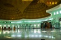 Al-Azhom Great Mosque, reflection of green pillars in Tangerang, Banten, Indonesia.