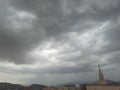 Al-Bahah region, dense clouds gather in a dramatic gray sky warning of rain on an autumn day with volatile weather Royalty Free Stock Photo