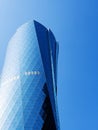 Al Bidda Tower against clear blue sky, close up, copy space. Financial success concept