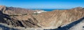 Al Bustan Palace near Old Town, Muscat in Oman looking down from mountains panning across the spectacular scene looking towards