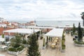 Al fresco dining on a deck with view of Ocean. Cafe terrace in Lisbon, Portugal