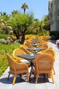 Al fresco wicker seats on the mediterranean hotel terrace, Crete