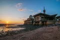 Al-Hussain Mosque by the sea with sunset views located in Perlis Malaysia.