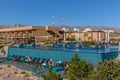 Al Jabal, Oman - Jan 22nd 2018 - The open swimming pool of the Anantara hotel in Al Jabal in Oman in a blue sky day.