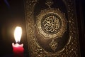 Al-Quran with candle light Royalty Free Stock Photo