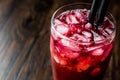 Alabama Slammer Cocktail with black straw. Royalty Free Stock Photo