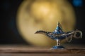 Aladdin`s magical genie lamp on bright moon background. Lamp of wishes concept. Antique arabian style