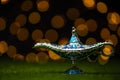 Aladdin`s magical genie lamp on soft lights dark background. Lamp of wishes concept. Antique arabian style