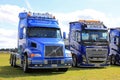 Blue Conventional and Cab Over Volvo Trucks