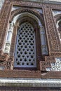 Alai Darwaza or Alai Gate window, the entrance to the Quwwat-Ul-Islam Mosque at Qutub Minar complex in New Delhi Royalty Free Stock Photo