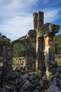 Alakilise ruins along Lycian way hiking trail, wall with arch remains of Alakilise or Church of the Angel Gabriel in Lycia Royalty Free Stock Photo
