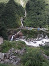 The Alaknanda River flows in the green hills in Kedarnath, Uttarakhand.