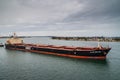 Alam Penting bulk carrier ship leaving port of Newcastle, Australia