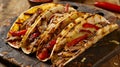 Alambre tacos stacked with tender meat and grilled bell peppers, drizzled with melting cheese, combine rich flavors and