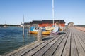 Aland Islands, Finland - July 12, 2019 - Girl sitting on the shore of the Baltic Sea. Aland Islands