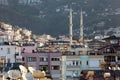 The Alanya cityscape with minarets of mosque and residential houses in center of city. Turkey