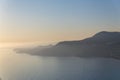 Alanya, Turkey - August, 8, 2019: View to the Alanya Deniz Feneri Alanya lighthouse from the beach.  People relax on the Mediter Royalty Free Stock Photo