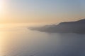 Alanya, Turkey - August, 8, 2019: View to the Alanya Deniz Feneri Alanya lighthouse from the beach.  People relax on the Mediter Royalty Free Stock Photo