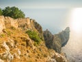 Alanya, Turkey. Beautiful view from the fortress Alanya Castle of the Mediterranean Sea and cliffs at sunset. Vacation postcard Royalty Free Stock Photo