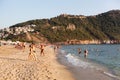 Alanya, Turkey-circa Oct, 2020: The Kleopatra beach during Covid-19 pandemic. Vacationers sunbathe and swim at resort season. It