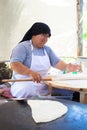 ALANYA, TURKEY - June 20, 2018: unidentified Woman, prepares pita bread on the street market. Royalty Free Stock Photo