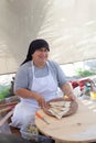 ALANYA, TURKEY - June 20, 2018: unidentified Woman, prepares pita bread on the street market. Royalty Free Stock Photo