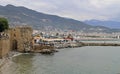 People are walking at red tower of Alanya castle Royalty Free Stock Photo