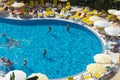 Alanya, Turkey - October 05, 2018. A group of people plays water polo in the blue clear water of the Kirman Sidera Luxury hotel