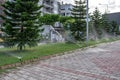 Lawn irrigation in a park area on the promenade in Alanya. Water spray system against the