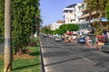 Paved road with transport on Ataturk Boulevard in Alanya. Beautiful cityscape of the city
