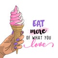 Eat more what you love - Hand holding strawberry and vanilla ice cream cone Royalty Free Stock Photo