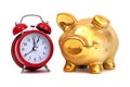 Alarm bell and golden piggy bank