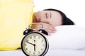 Alarm clock being placed on a nightstand