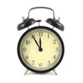 Alarm clock in black case and beige clockface isolated close up Royalty Free Stock Photo