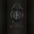 Alarm clock with Black Friday text isolated on black background, sign for ticket gift card, promotional or advertising banner,