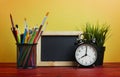 Alarm Clock, Blackboard, Plant and School Stationary in Basket o