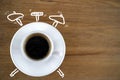 Alarm clock and coffee concept with doodle. Realistic cup of black americano in white cup with hand drawn sketch of alarm clock Royalty Free Stock Photo