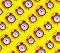Alarm clock on a colored background decorative concept pattern morning