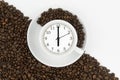 Alarm clock in a cup of coffee. Photo creative