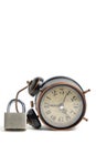 Alarm clock and lock white background.Concept of hope and value of time, time management, deadlines and urgency. Royalty Free Stock Photo