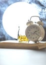 Alarm clock, mask, pills on the background of the moon and night sky. Sleeping disorder or insomnia concept Royalty Free Stock Photo