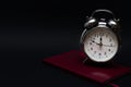 Alarm clock and notebook on black background, 2019 Royalty Free Stock Photo